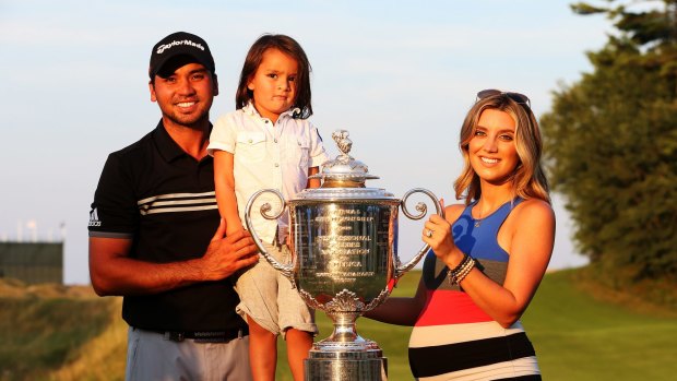 Family portrait: Jason Day, son Dash and wife Ellie pose with the Wanamaker trophy.