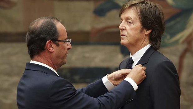 French President Francois Hollande appoints the former Beatle Paul McCartney to the Legion of Honour.