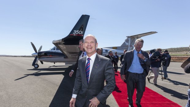 Queensland Premier Campbell Newman being welcomed by members of the Wagner family