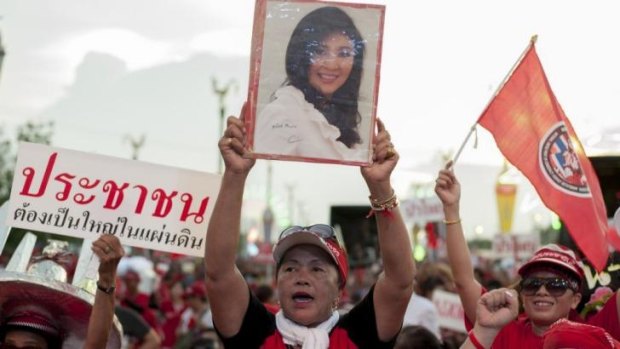 High stakes: pro-government red shirts rally in support of ousted prime minister Yingluck Shinawatra on the outskirts of Bangkok at the weekend.