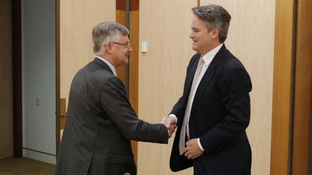 Dr Martin Parkinson, Treasury Secretary greets Senator Mathias Cormann ahead of the hearing into the mining tax in April. The two disagree about whether Treasury is independent from the Labor government.