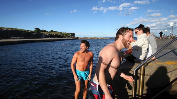 Weekend dip for UK visitors at Clovelly Beach.