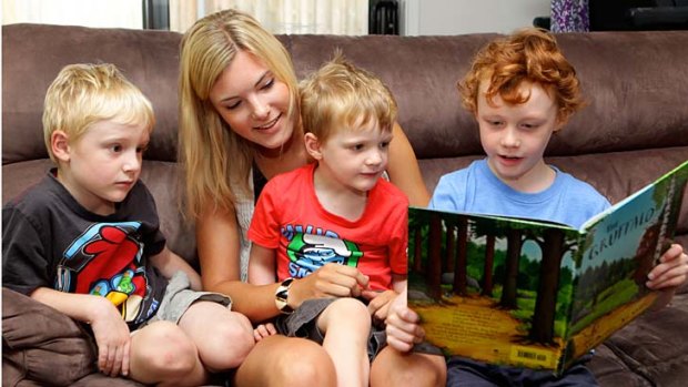 ''Like a big sister'' &#8230; German au pair Michelle Kaiser reads with the Rouwhorst boys - Alexander, 5, Samuel, 3, and Joshua, 8.