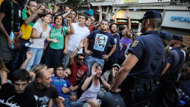 Police prevent 'indignants' from entering Puerta del Sol square in Madrid, Spain. The indignants came from across the country to protest high levels of unemployment.