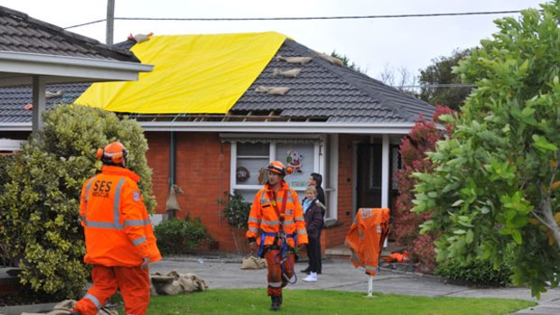 Sunday night's storm badly damaged the roof of this house in Aspendale, which was one of the suburbs hardest hit by lightening.