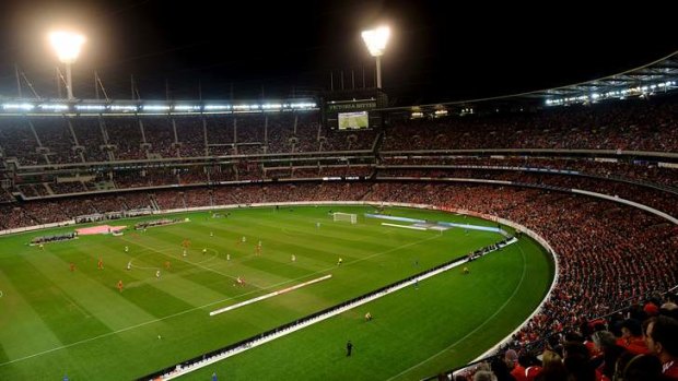 95,446 soccer fans crammed into the packed MCG to unite and sing the Liverpool anthem <i>You'll Never Walk Alone</i>.