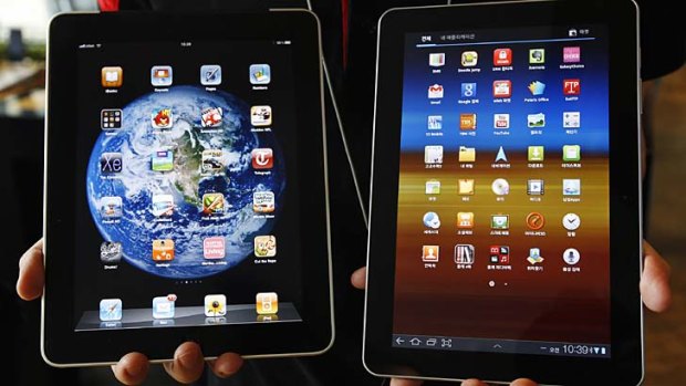 Fighting it out ... Apple's iPad, left, and Samsung's Galaxy Tab 10.1 .