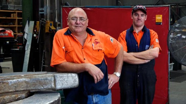 From the factory floor, father and son look to future amid the gloom