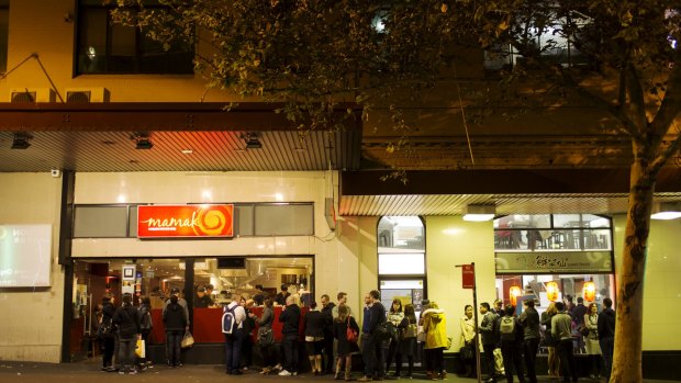 People queuing up to enter Mamak restaurant in China Town, Sydney. 