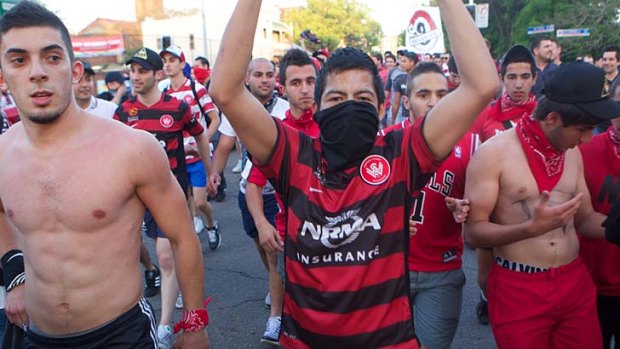 Derby day ... Western Sydney Wanderers fans arrive at Parramatta Stadium to watch their team face Sydney FC in the city's first A-League derby.