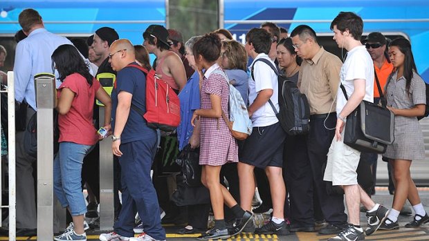 Crowd crush ... Commuters at the already-busy Werribee train station.