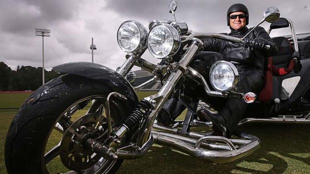 Melbourne Rebels chief executive Rob Clarke on his Harley Davidson Trike at AAMI Park on Wednesday.