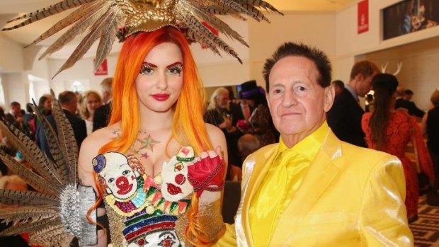 The happy couple: Gabi Grecko shows off her engagement ring with Geoffrey Edelsten.