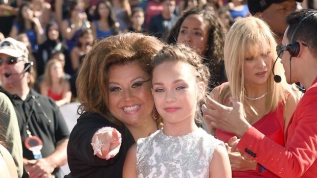Mommie dearest: Maddie stars in <i>Dance Moms</i>, a reality programme which follows the young girls from Pennsylvania's Abby Lee Dance Company – and their loving mothers.