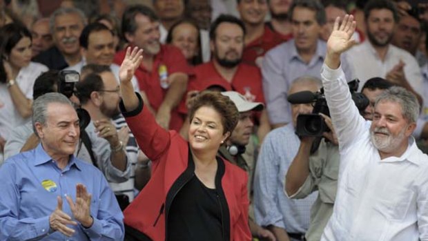 "Once people knew she was Lula's candidate, they backed her."... Luiz Inacio Lula da Silva alongside Dilma Rousseff.