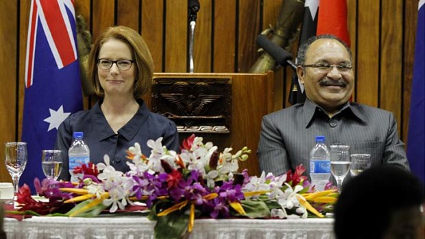 Prime Minister Julia Gillard with PNG Prime Minister Peter O'Neill at state dinner in Port Moresby.