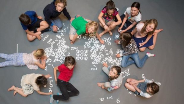 Word to the wise: Children play with letters as part of an exhibition by artist  Emily Floyd at the NGV.