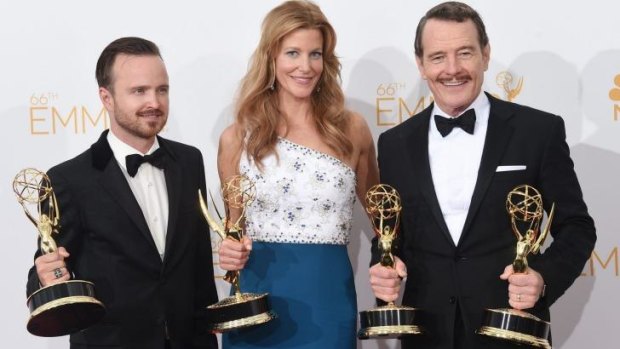 Breaking good: Aaron Paul, Anna Gunn and Bryan Cranston with their Emmy haul for Breaking Bad. 