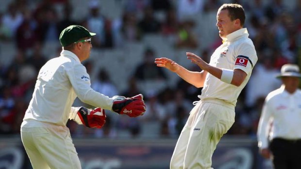 How it's done ... Peter Siddle celebrates with Brad Haddin.