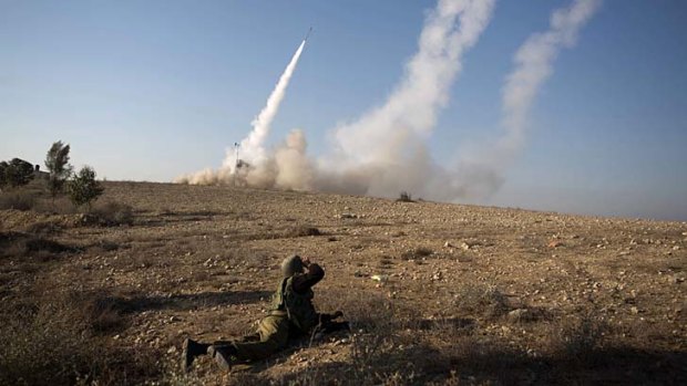 Israeli military launch a missile from the Iron Dome missile system in the southern city of Beer Sheva.