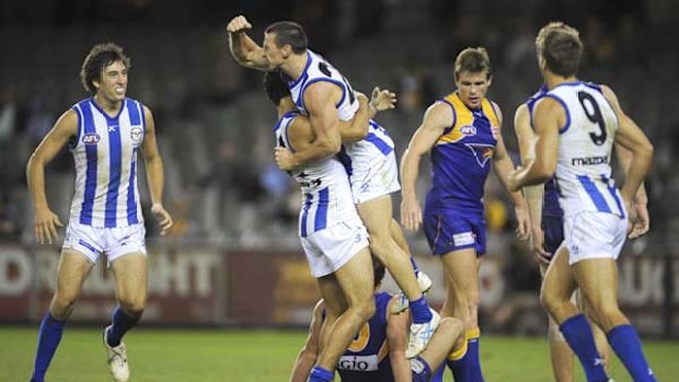 Brent Harvey celebrates a goal during his best on ground performance against the Eagles in round three.