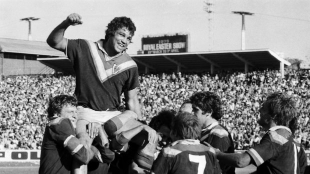 Roosters legend: Eastern Suburbs players hold aloft Arthur Beetson after their victory in the 1974 grand final over Canterbury Bankstown.