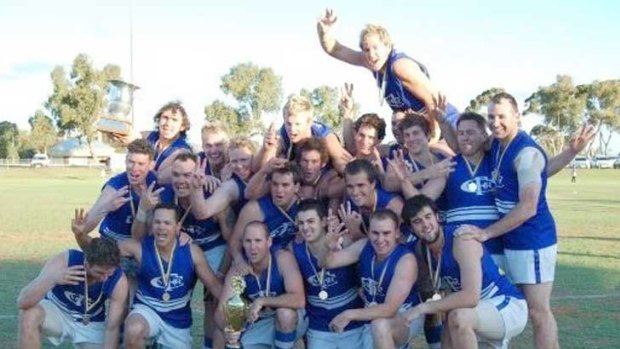 Grae Grant, (bottom, third from right) with his Kalgoorlie Mines Rovers teammates after their premiership win in 2009.