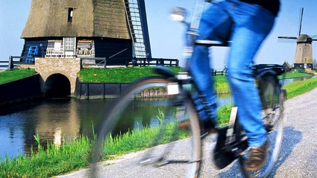 Outdoor life ... windmills and cycling in Holland.
