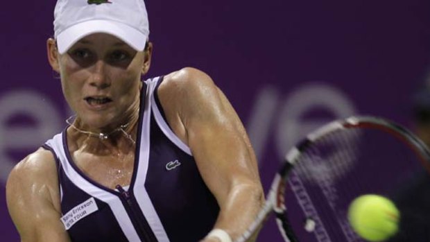 Samantha Stosur in action against Belgium's Kim Clijsters during the semi finals of the Qatar WTA Tennis Championship in Doha, Qatar.