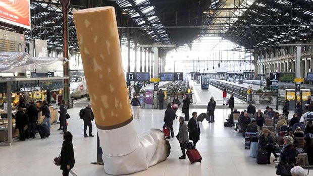 A giant mock-up discarded cigarette at the Gare de Lyon railway station in Paris is part a public-awareness campaign launched by France's national rail company SNCF to shed light on commuters' disrespectful behaviour.
