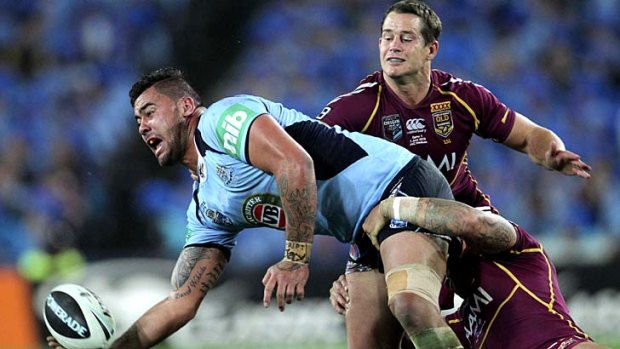 Blue moon: Andrew Fifita gets an offload away for NSW.