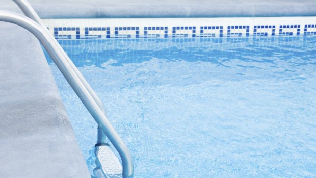 Police are investigating how a woman drowned in a Cairns resort pool.