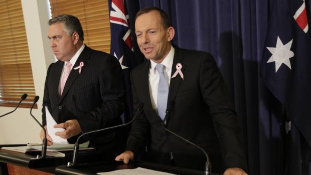 Tony Abbott and Joe Hockey respond to the Mid-Year Economic and Fiscal Outlook at Parliament House in Canberra.