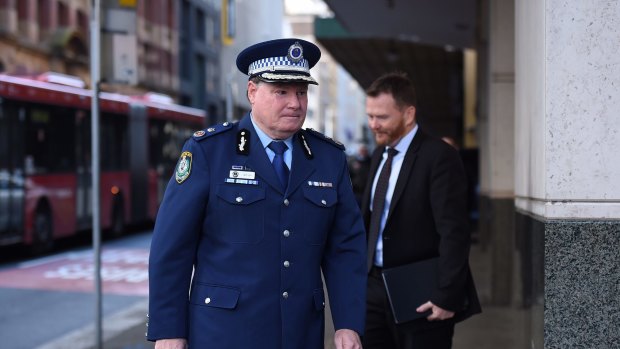 NSW Police acting Deputy Commissoner Jeff Loy, left, arrives at the Lindt cafe siege inquest on Monday.