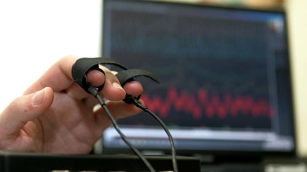 Lie detector test ... a computerised polygraph machine is tested in Moscow.