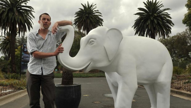Artist Damon Kowarsky with one of the elephants to be painted and displayed around Melbourne.