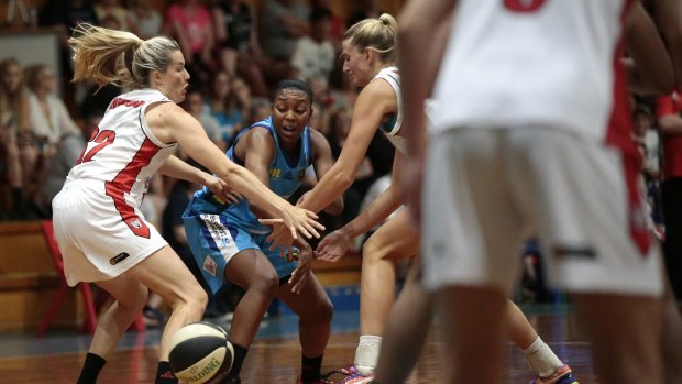 Canberra's Renee Montgomery can't escape Perth's tight defence in a 89-63 loss.