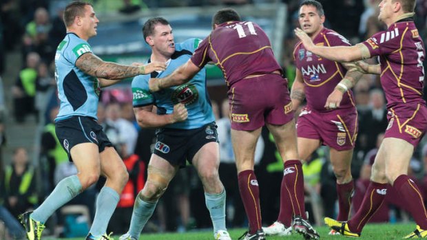 Paul Gallen and Nate Myles trade blows in 2013.