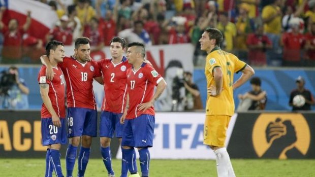 Relieved Chile players gather after their win.