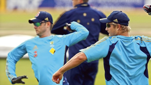 Gloves are on ... Shane Watson (right) and Michael Clarke fire in throw-downs during training at Bellerive Oval yesterday.