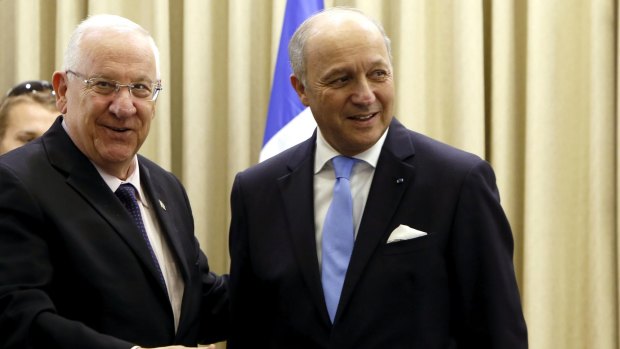 Israeli President Reuven Rivlin, left, and French foreign minister Laurent Fabius. France has been sounding out the possibility of relaunching the peace process.