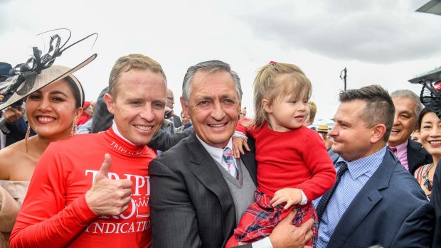 Red-letter day: Kerrin McEvoy, Peter Snowden and Paul Snowden soak in victory.