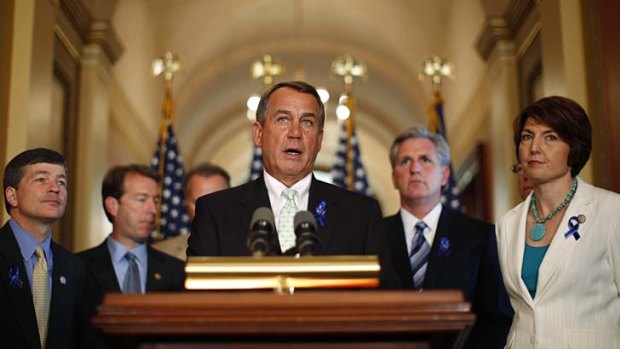 Minutes to midnight ... Republican Speaker John Boehner's debt plan faces opposition close to home.