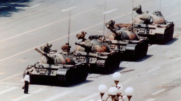 A lone protester faces Chinese tanks in Tiananmen Square; Zhao Ziyang at home in Beijing in 2002.