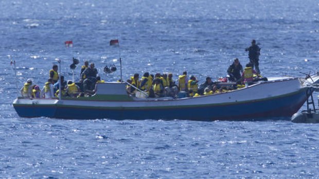 A boat load of asylum seekers intercepted off Christmas Island.