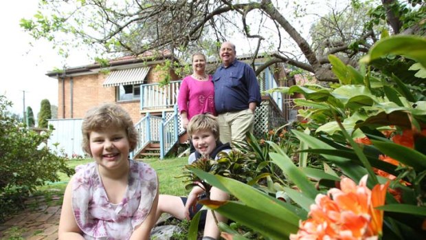On the market ... Rachel and Toby Billington with their children, Anna, 10, and Jack, 12, at their Forestville home.