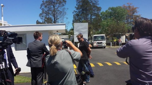 A man is arrested after raids at Aspley, in Brisbane's north.