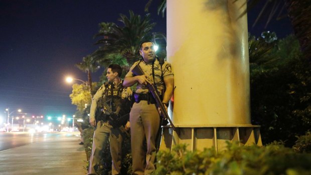 Police officers at the scene of a suspected shooting in Las Vegas.