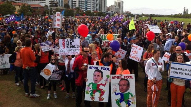 Thousands gather at the rally as teachers strike over education cuts.