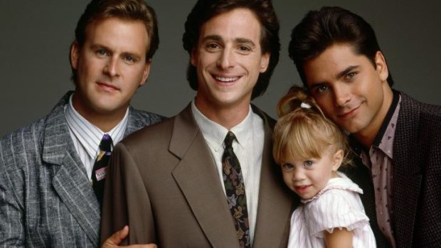 The cast of family comedy <i>Full House</i>, Dave Coulier, Bob Saget, John Stamos and one of the Olsen twins.